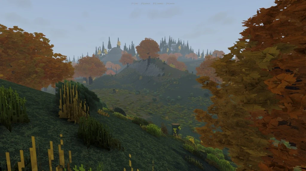 Autumn hills and valleys under a pale sky, with orange canopy covering the slopes